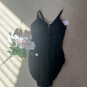 Black one piece swimsuit with gold details and two rings